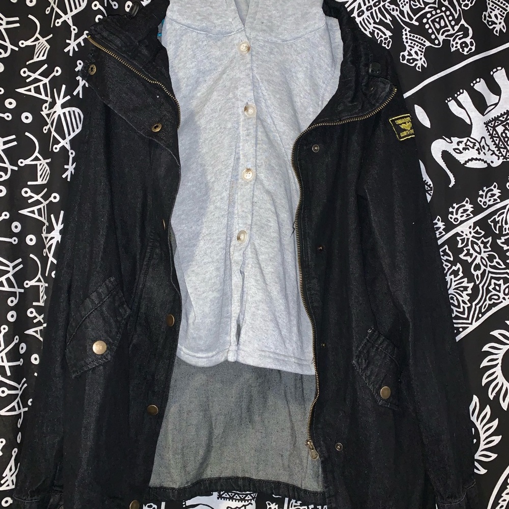 black over coat with grey button up vest